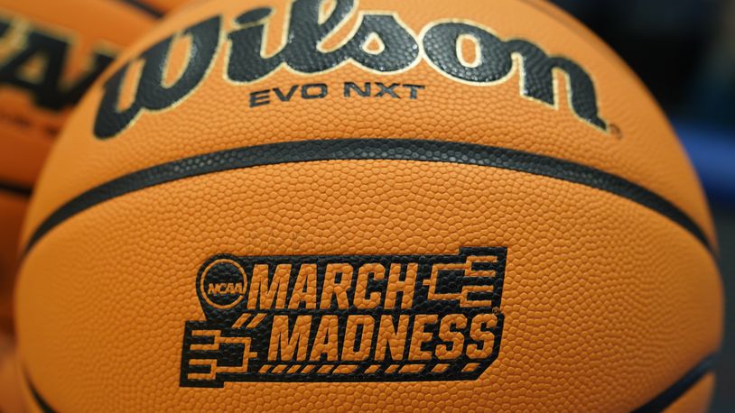A basketball sits on a rack before a First Four college basketball game between Fairleigh Dickinson and Texas Southern in the NCAA men's basketball tournament, Wednesday, March 15, 2023, in Dayton, Ohio. The 2024 First Four returns to Dayton March 19-20 at UD Arena. (AP Photo/Darron Cummings)