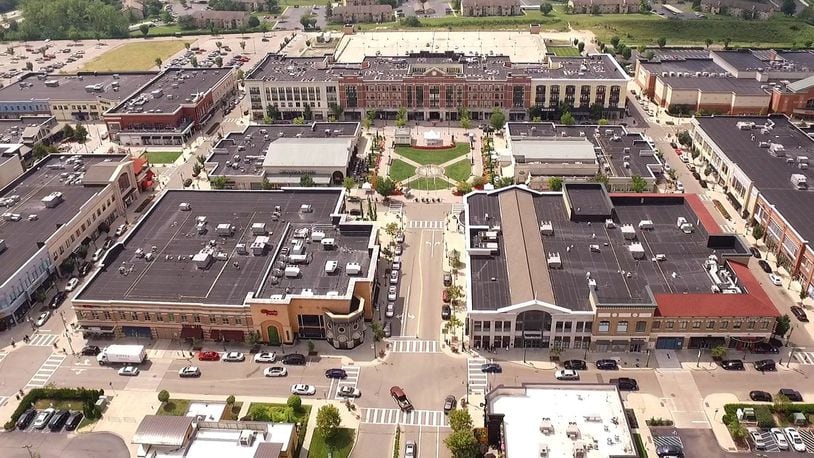 The Greene Town Center in Beavercreek opened in 2006 and is now boasting more than 100 shops and restaurants in the mixed retail open shopping center. TY GREENLEES / STAFF