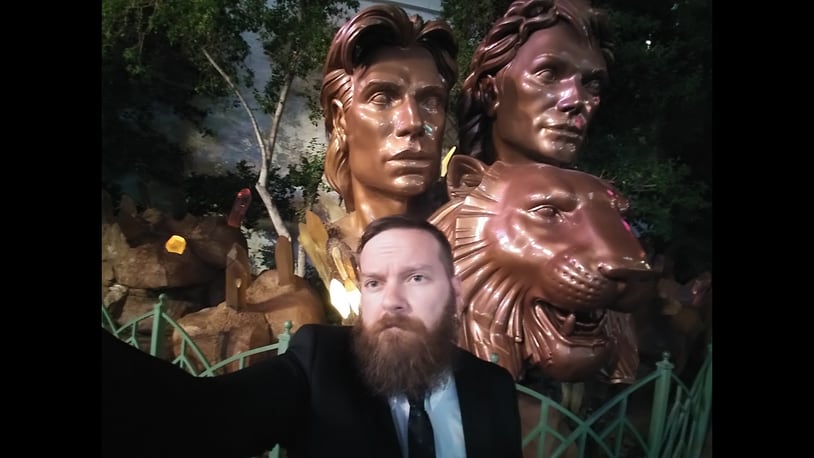 Daytonian of the Week Andy Rowe in front of a Siegfried and Roy statue in Las Vegas?