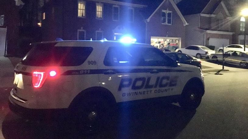 Police say a woman was killed when her friend was cleaning a gun.