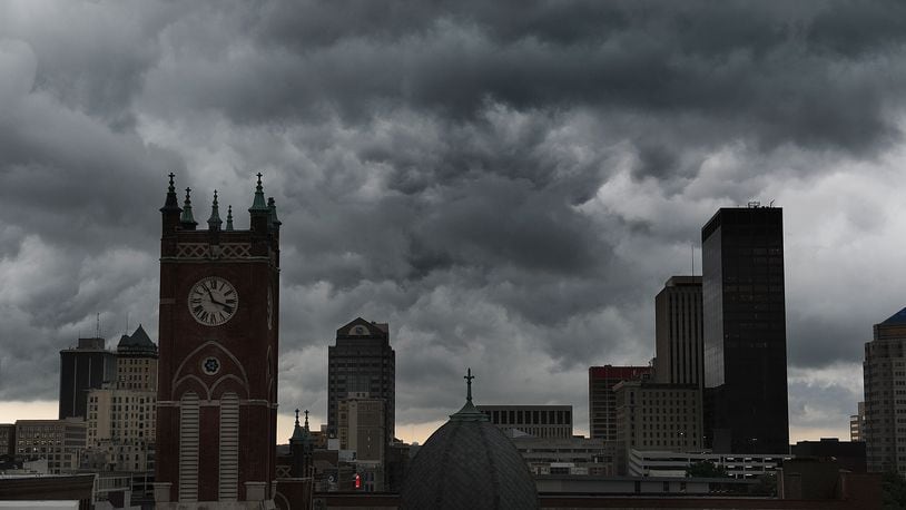 Storm clouds move over downtown Dayton, Wednesday, July 6, 2022. MARSHALL GORBY\STAFF