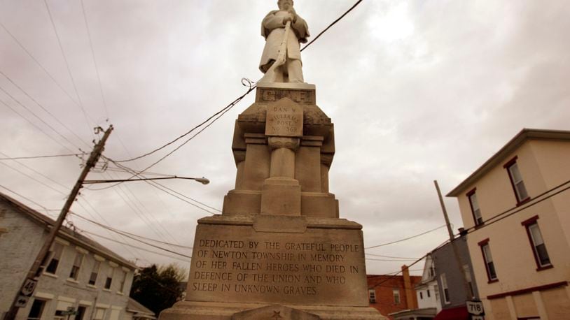 A view of the Pleasant Hill Civil War Soldier monument on Main Street in Pleasant Hill. The village was to move the solider out of the middle of Ohio 48 and 718 but now there are those who are changing their minds. The state already gave the village lots of new money for street upgrades with agreement Soldier would be moved to a near park nearby. Photo by Jim Witmer