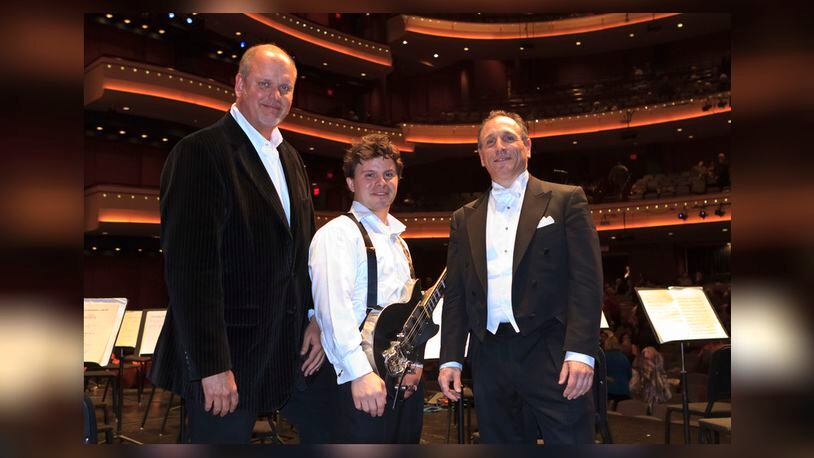 (left to right) Composer Michael Daugherty, guitarist D.J. Sparr and DPO Artistic Director and Conductor Neal Gittleman following a performance of “Gee’s Bend,” which is featured on the latest CD release from the Dayton Philharmonic Orchestra. PHOTO BY ANDY SNOW
