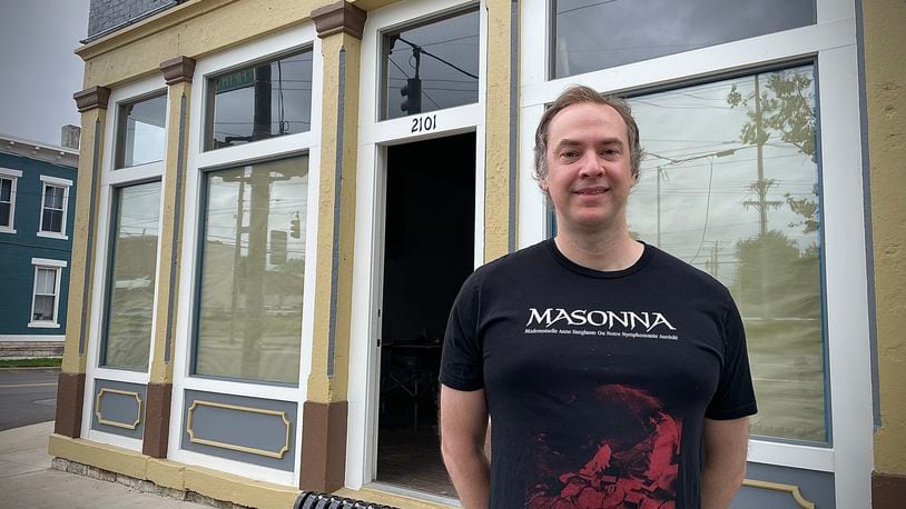Skeleton Dust Records is planning to move from Dayton’s Fire Blocks District to the Huffman Historic Area on East Fifth Street in September. Pictured is owner Luke Tandy. NATALIE JONES/STAFF