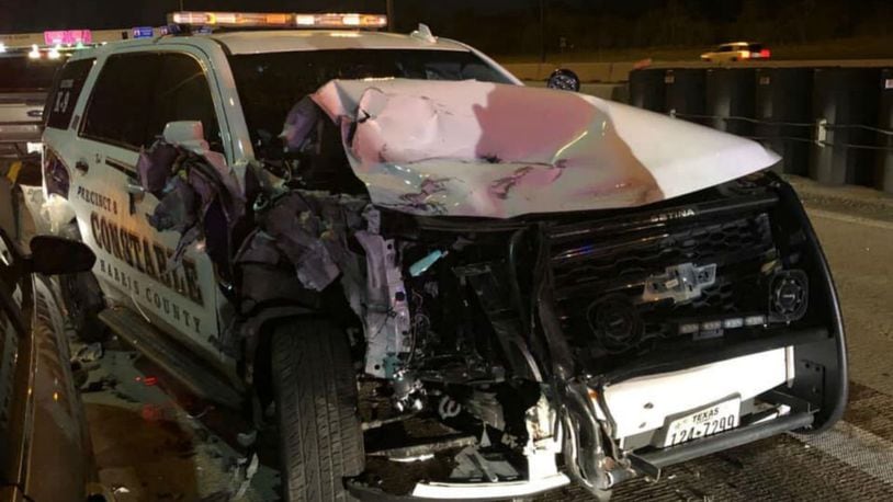 Twin brothers were charged with driving under the influence after crashing into deputies investigating a fatal accident. (Photo: Harris County Constable's Office)