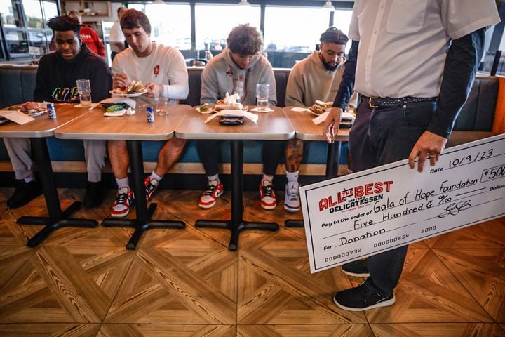 OSU players sandwich eating competition for charity