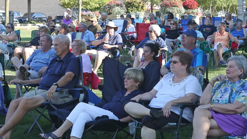 People enjoy the music of Mother's Jazz Collective as they kicked off the evening Friday, August 19, 2022 at the Springfield Jazz and Blues Festival in National Road Commons Park. BILL LACKEY/STAFF