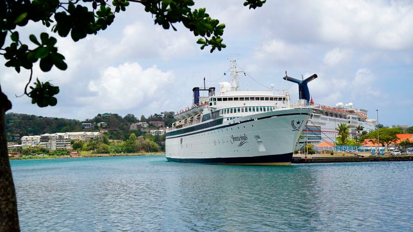 The Freewinds cruise ship is docked in the port of Castries, the capital of St. Lucia, Thursday, May 2, 2019. Authorities in the eastern Caribbean island have quarantined the ship after discovering a confirmed case of measles aboard. (AP Photo/Bradley Lacan)