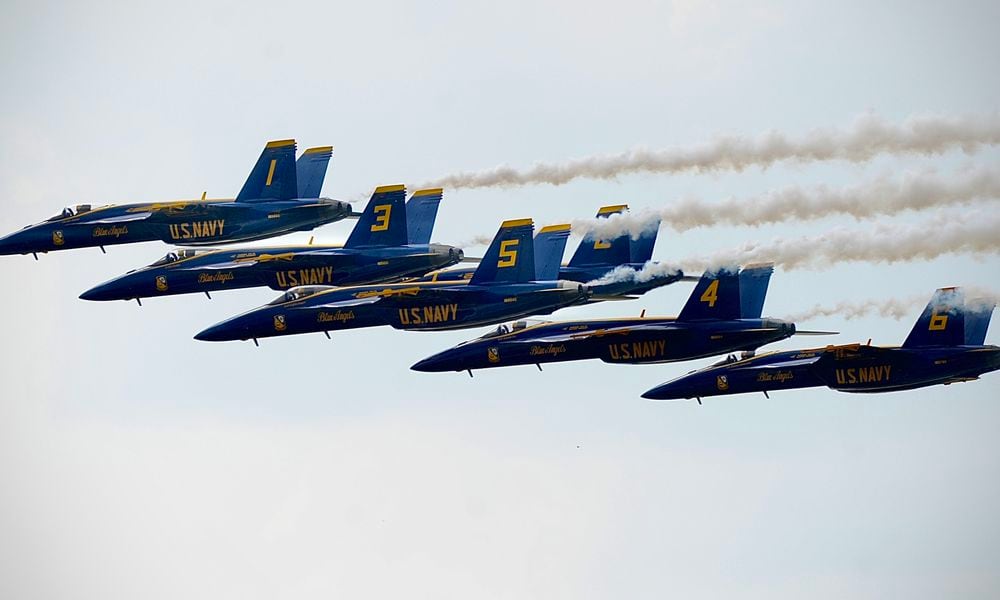The U.S. Navy Blue Angels fly in formation as they arrive in Dayton Wednesday, June 19, 2024, ahead of the CenterPoint Energy Dayton Air Show this weekend at the Dayton International Airport. MARSHALL GORBY\STAFF