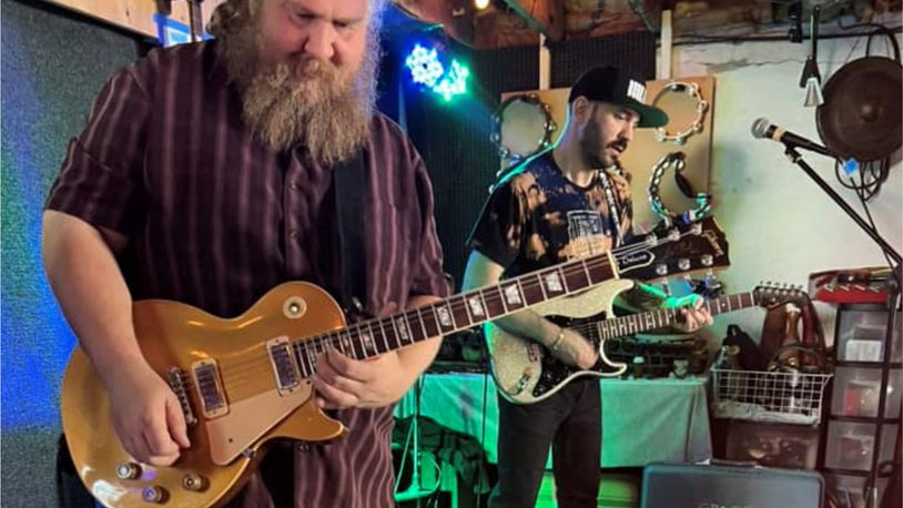 Guitarists Patrick Himes (left) and Nathan Lewis rehearsing for This Must Be the Party, the Talking Heads tribute headlining a benefit for Stivers School for the Arts’ Seedling Foundation at The Brightside in Dayton on Friday, April 14.