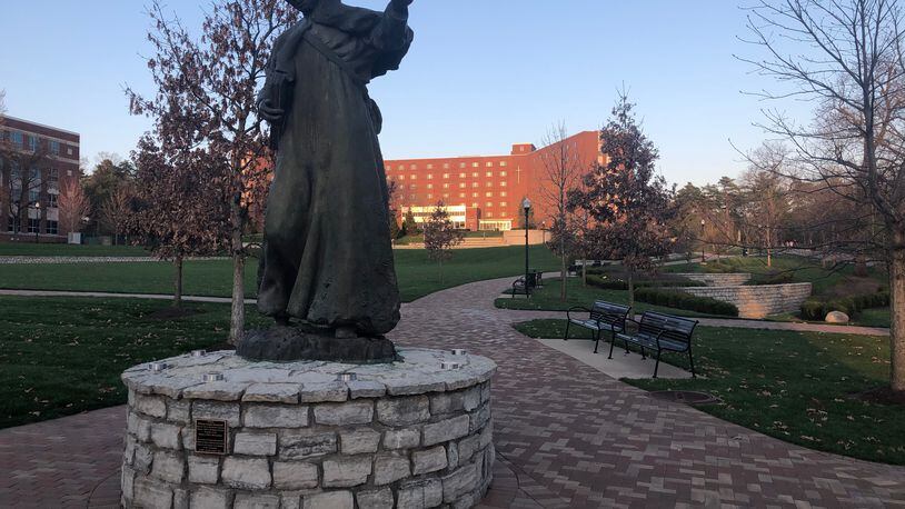 The Joseph Chaminade statue at the University of Dayton, which has shifted all of its first-week fall semester 2020 classes online because of COVID-19 testing and contact-tracing results. JEREMY P. KELLEY / STAFF
