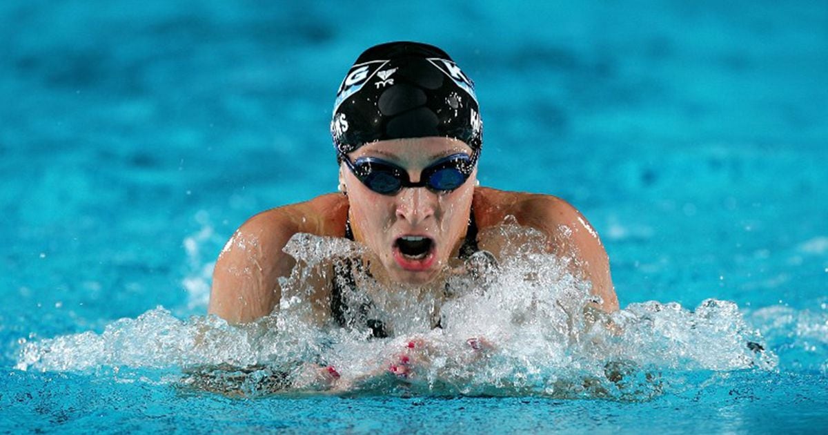 Former world swimming champ says coach sexually abused her