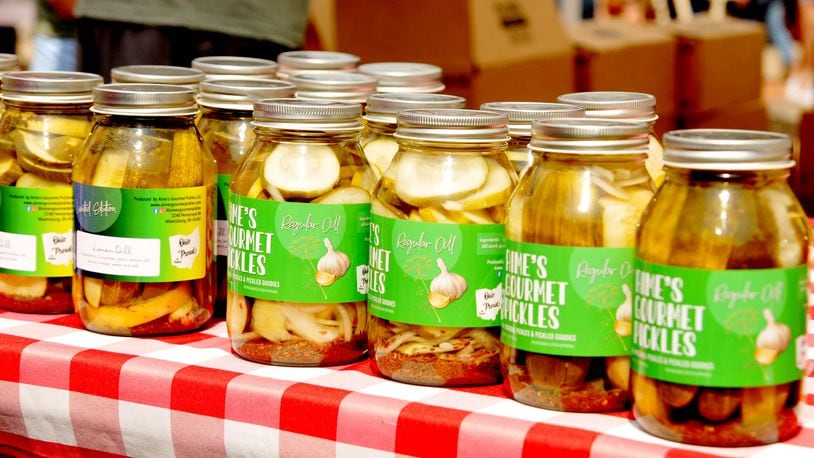 You can find an assortment of pickled-themed foods including pickle egg rolls, dill pickle popcorn, deep fried pickles and many other unique pickle dishes at Pickle Fest on Saturday, June 29 at Austin Landing. DAVID A. MOODIE/CONTRIBUTING PHOTOGRAPHER