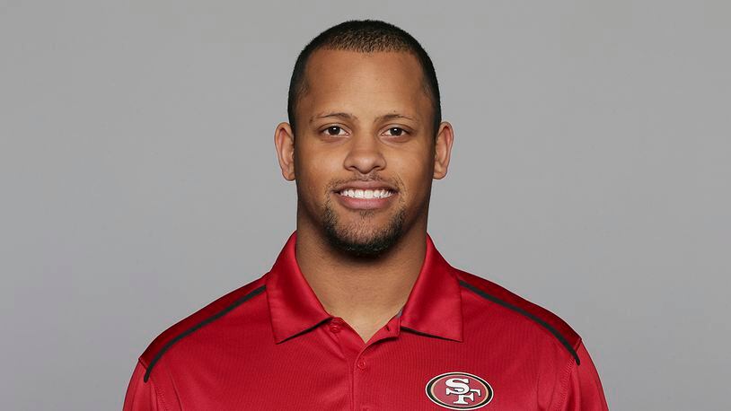This 2016 file photo shows Keanon Lowe of the San Francisco 49ers NFL football team. Lowe, a former analyst for the 49ers and wide receiver at the University of Oregon, subdued a person with a gun who appeared on a Portland, Oregon high school campus Friday, May 17, 2019. Lowe is now a coach at Parkrose High School.