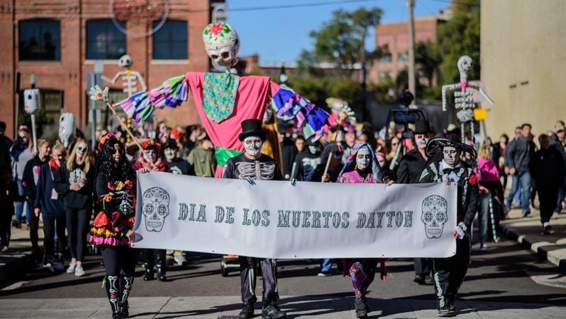 Dia De Muertos or Day of the Dead was celebrated in Dayton over the weekend on Sunday, Oct. 21 with a parade and celebration that included Day of the Dead alters, food, sugar skulls, music, traditional dance and more. TOM GILLIAM / CONTRIBUTING PHOTOGRAPHER