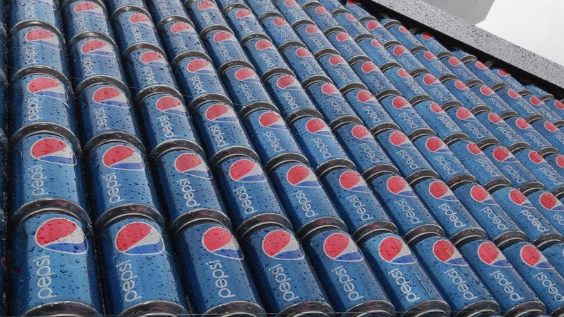 FILE PHOTO: A can of Pepsi wasn't enough for two men. Police said they stole an entire vending machine and it was caught on video.