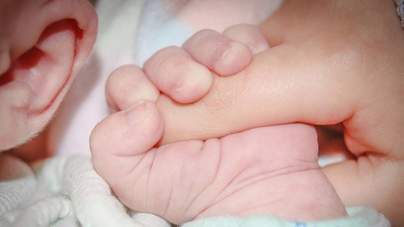 A 74-year-old woman gave birth to twin girls Thursday, doctors in southern India said.