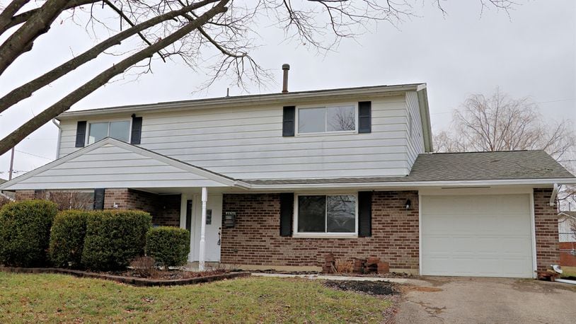 Listed for $264,985, the brick-and-vinyl home at 4520 Pennyston Avenue in Huber Heights has about 2,122 square feet of living space. CONTRIBUTED PHOTOS BY KATHY TYLER