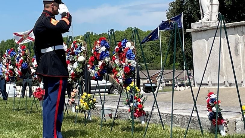 Members representing each branch of the military services set wreaths during Memorial Day ceremonies in 2023 at the Dayton National Cemetery. NICK BLIZZARD/STAFF